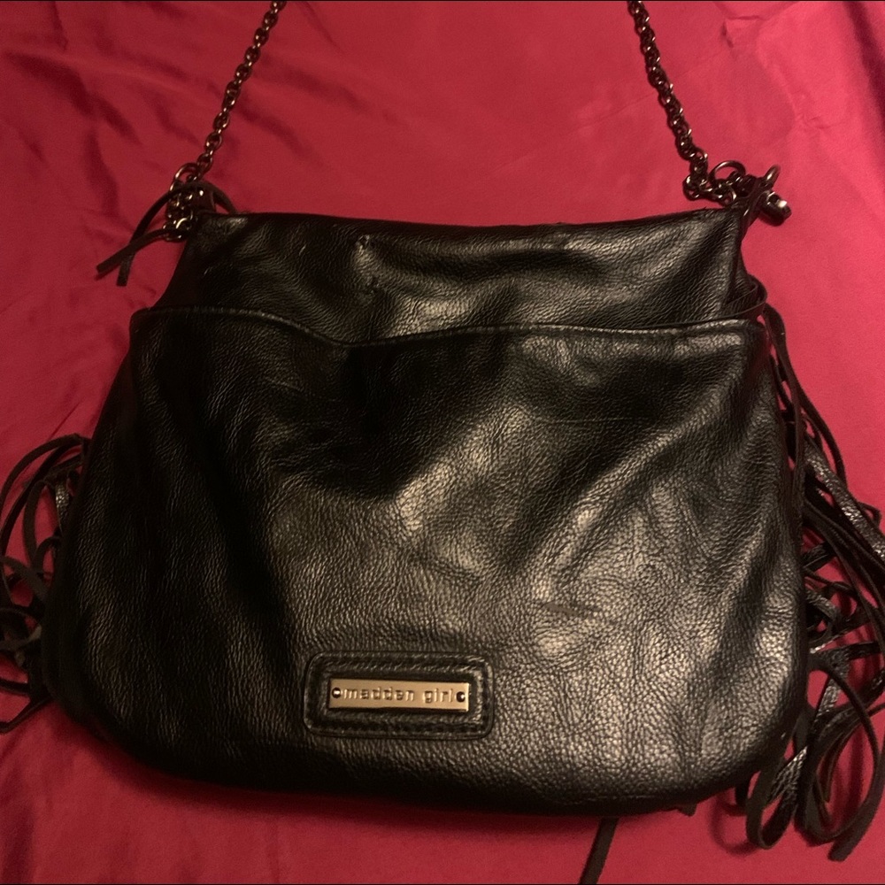 Black slightly used Madden girl cross body bag